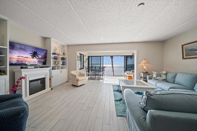 Breathtaking Beach access oversized waterfront condo located in