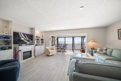 Breathtaking Beach access oversized waterfront condo located in
