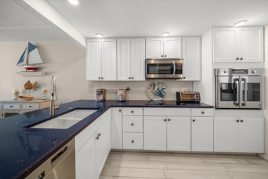 Breathtaking Beach access oversized waterfront condo located in