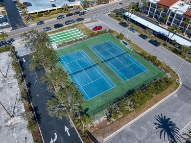 Breathtaking Beach access oversized waterfront condo located in