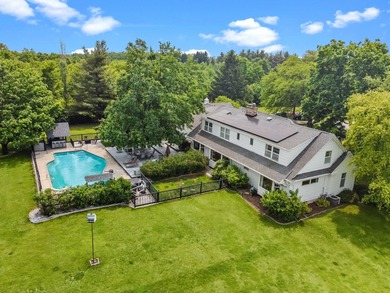 IMPROVED PRICE! Radiating country charm, this home has a warm