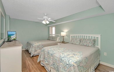 Welcome to Unit 810 at Crescent Shores, an elegantly updated