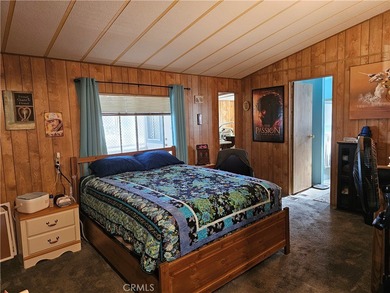 Perfectly situated on an oversized corner lot within the highly