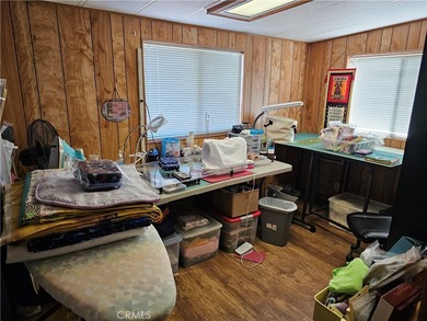 Perfectly situated on an oversized corner lot within the highly