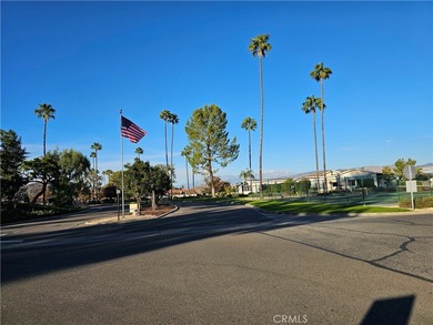 Perfectly situated on an oversized corner lot within the highly