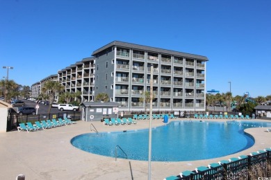 This 2BR/2BA condominium is located on the top floor of the