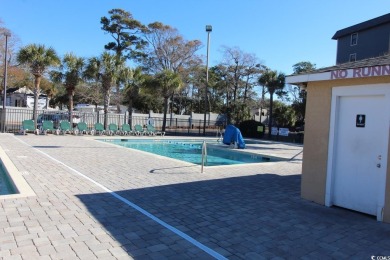 This 2BR/2BA condominium is located on the top floor of the