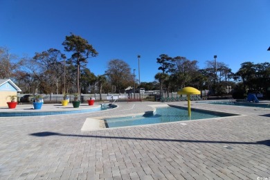 This 2BR/2BA condominium is located on the top floor of the