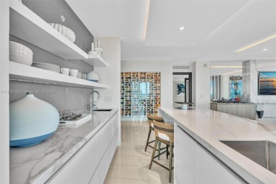 Live above the sand in Residence 1201 at Las Olas Beach Club --