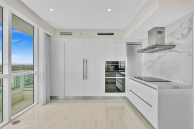 Live above the sand in Residence 1201 at Las Olas Beach Club --