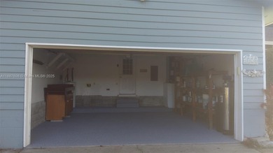 NICE HOUSE. The main level features three bedrooms, two