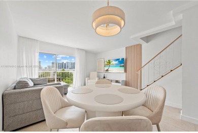 Elegant 2-Story Penthouse Condo just 1 Block from the Beach!