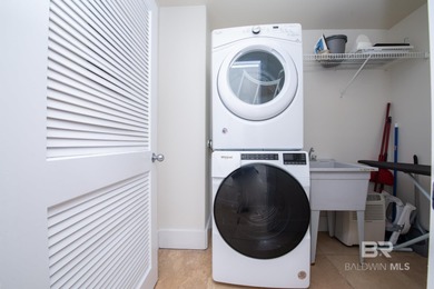 Welcome to this spacious 3-bedroom, 3-bath unit with a media