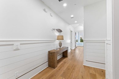 Experience Palm Court at Inlet Beach, a captivating boutique