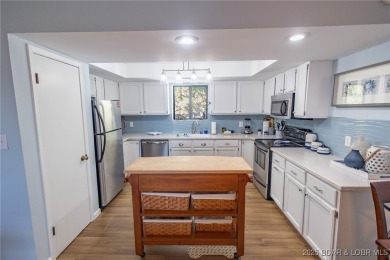 Welcome to Eleven West Condominiums! This beautiful top floor