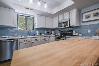 Welcome to Eleven West Condominiums! This beautiful top floor