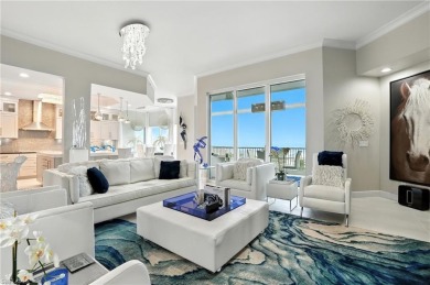 Perched at the very end of Bay Beach Lane, this exceptional