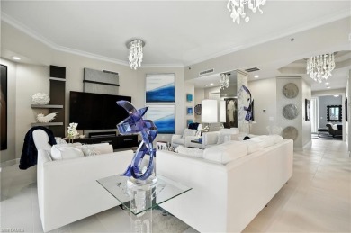 Perched at the very end of Bay Beach Lane, this exceptional