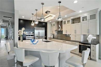 Perched at the very end of Bay Beach Lane, this exceptional