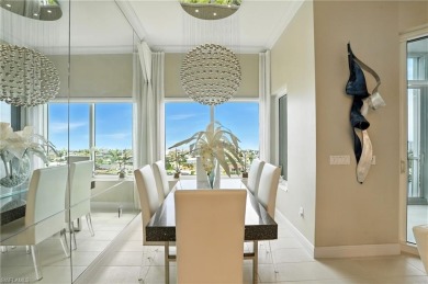 Perched at the very end of Bay Beach Lane, this exceptional