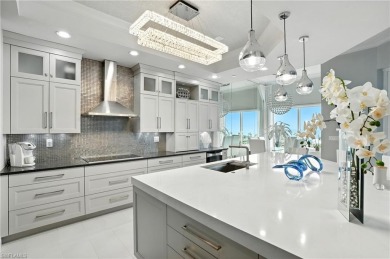 Perched at the very end of Bay Beach Lane, this exceptional