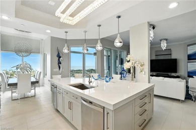 Perched at the very end of Bay Beach Lane, this exceptional