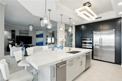 Perched at the very end of Bay Beach Lane, this exceptional