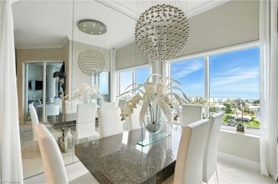 Perched at the very end of Bay Beach Lane, this exceptional