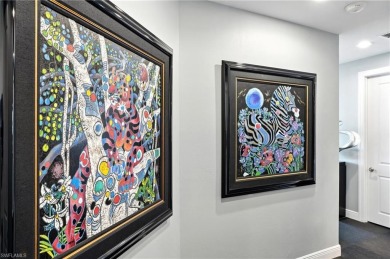 Perched at the very end of Bay Beach Lane, this exceptional