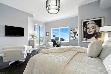 Perched at the very end of Bay Beach Lane, this exceptional