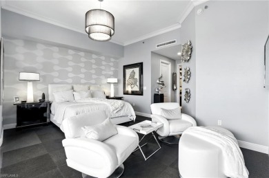 Perched at the very end of Bay Beach Lane, this exceptional