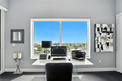 Perched at the very end of Bay Beach Lane, this exceptional