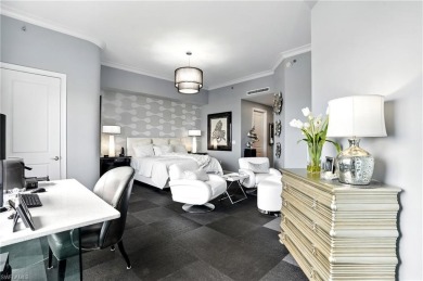 Perched at the very end of Bay Beach Lane, this exceptional