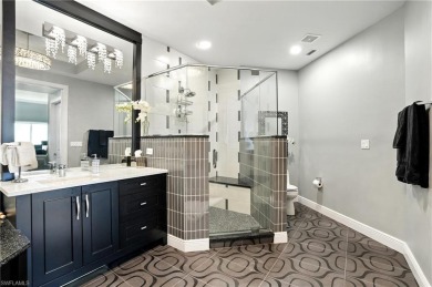 Perched at the very end of Bay Beach Lane, this exceptional