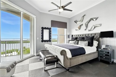 Perched at the very end of Bay Beach Lane, this exceptional