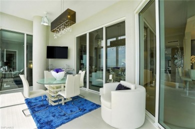 Perched at the very end of Bay Beach Lane, this exceptional