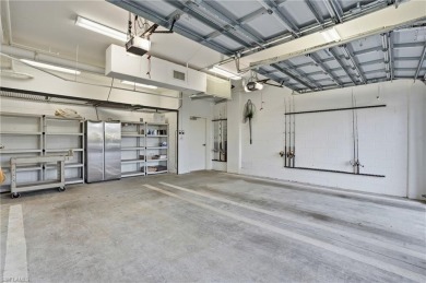 Perched at the very end of Bay Beach Lane, this exceptional