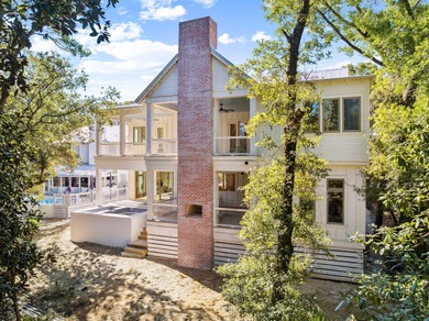 NOTHING SHORT OF SENSATIONAL! This opulent Seagrove Beach custom