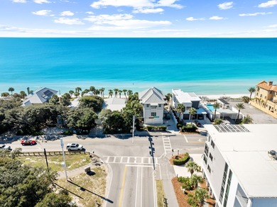 NOTHING SHORT OF SENSATIONAL! This opulent Seagrove Beach custom