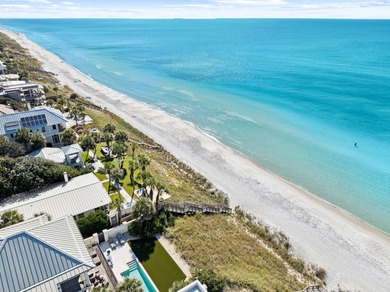 NOTHING SHORT OF SENSATIONAL! This opulent Seagrove Beach custom