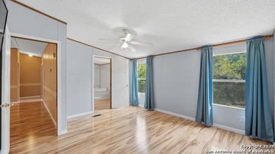 Enjoy Hill Country living in this lovely 3-bedroom, 2-bath home