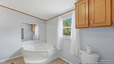 Enjoy Hill Country living in this lovely 3-bedroom, 2-bath home