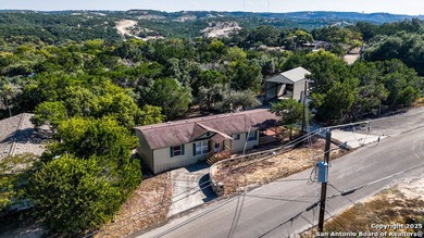 Enjoy Hill Country living in this lovely 3-bedroom, 2-bath home