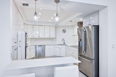 This sophisticated 2,600+ SF residence at Sloan's Curve offers