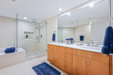 This sophisticated 2,600+ SF residence at Sloan's Curve offers