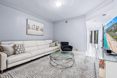 This sophisticated 2,600+ SF residence at Sloan's Curve offers