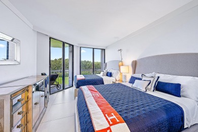 This sophisticated 2,600+ SF residence at Sloan's Curve offers