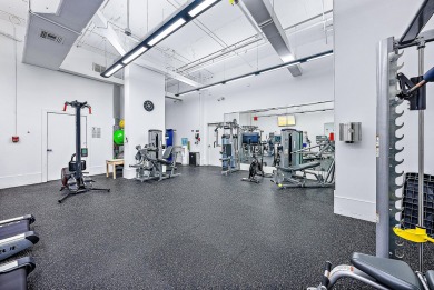 This sophisticated 2,600+ SF residence at Sloan's Curve offers