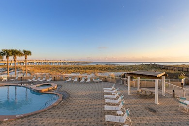 Set on Navarre Beach's iconic shoreline, Unit 105 at The Inn at