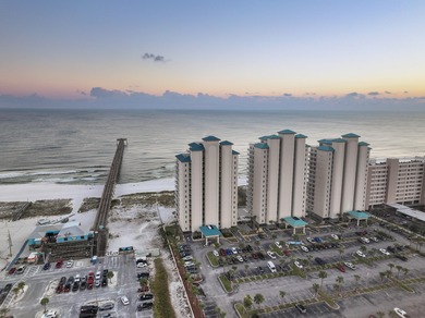 Set on Navarre Beach's iconic shoreline, Unit 105 at The Inn at